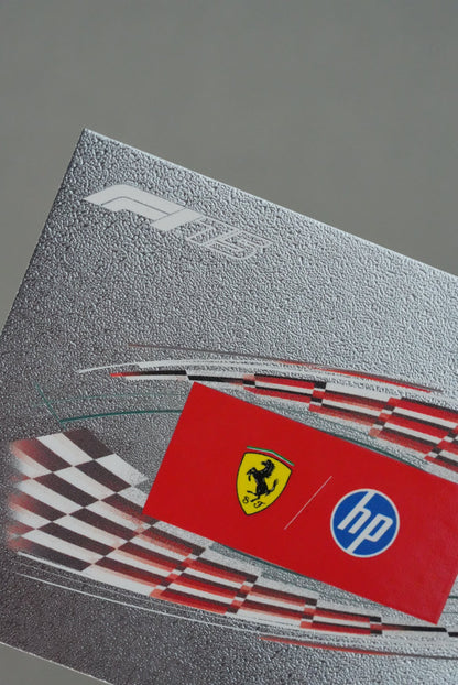 Close-up of F1 75 logo and foil finish on Ferrari HP team card from Turbo Attax 2025