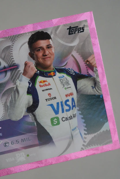 Detail view of Isack Hadjar’s portrait on F1 Turbo Attax 2025 pink holo card, showing sponsor logos