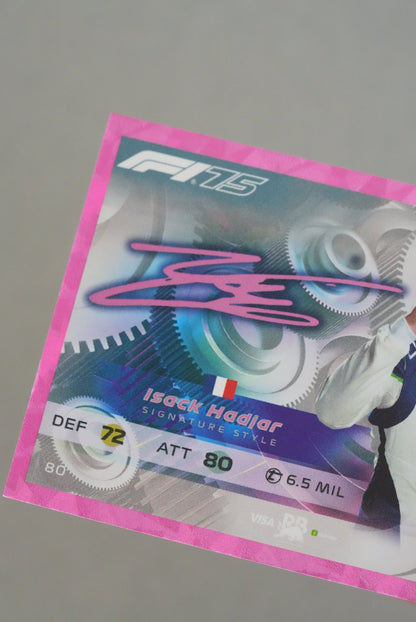 Close-up of Isack Hadjar F1 card showing holographic signature and defensive rating of 72
